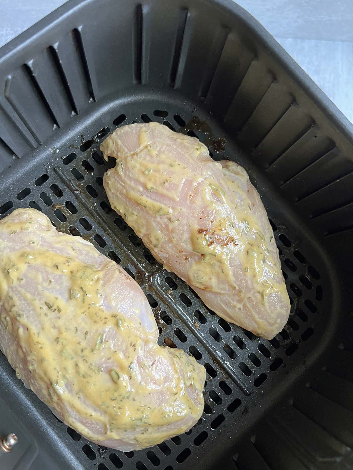 chicken in air fryer basket