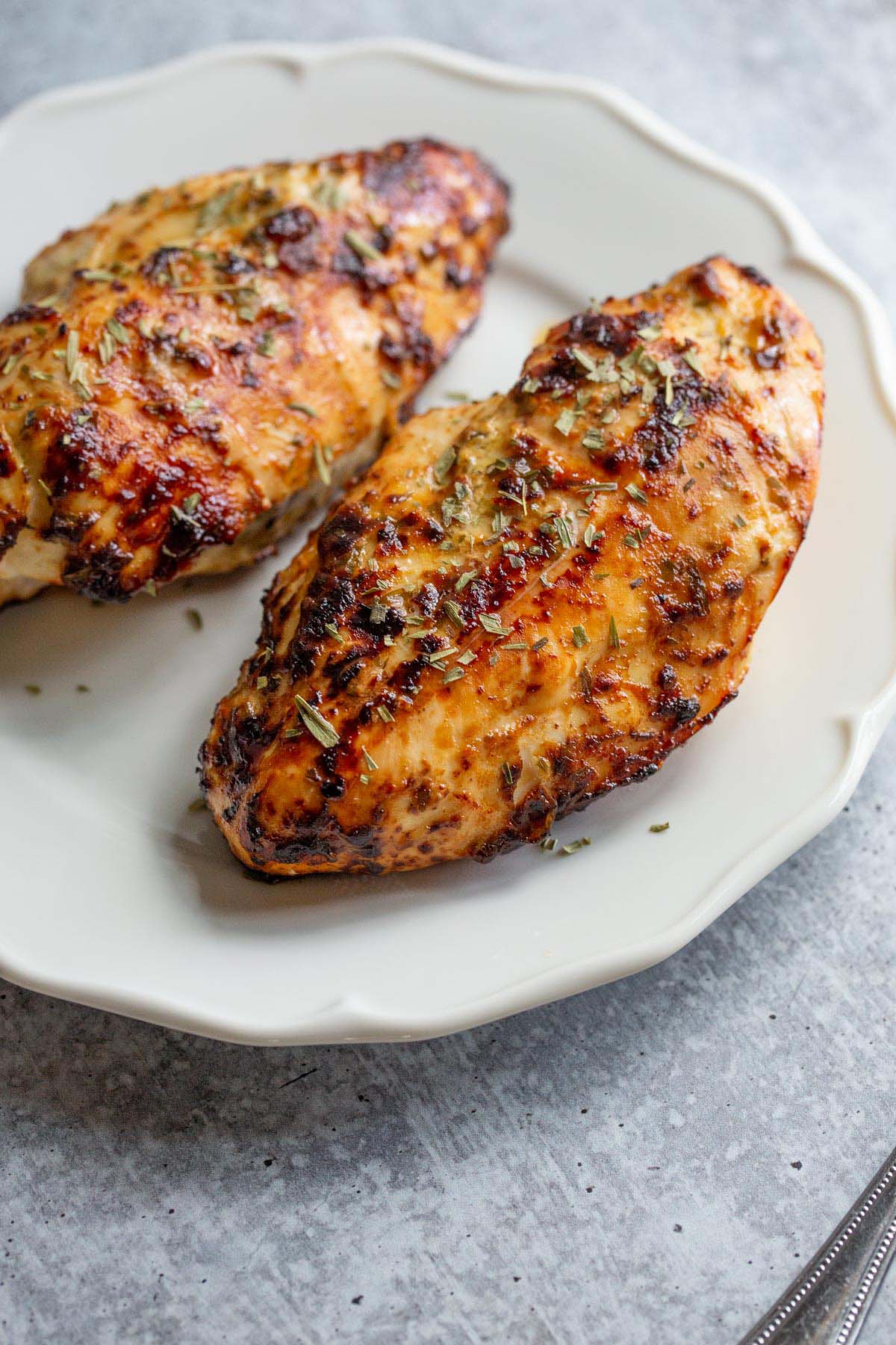 Air Fryer Honey Dijon Chicken on a white plate.