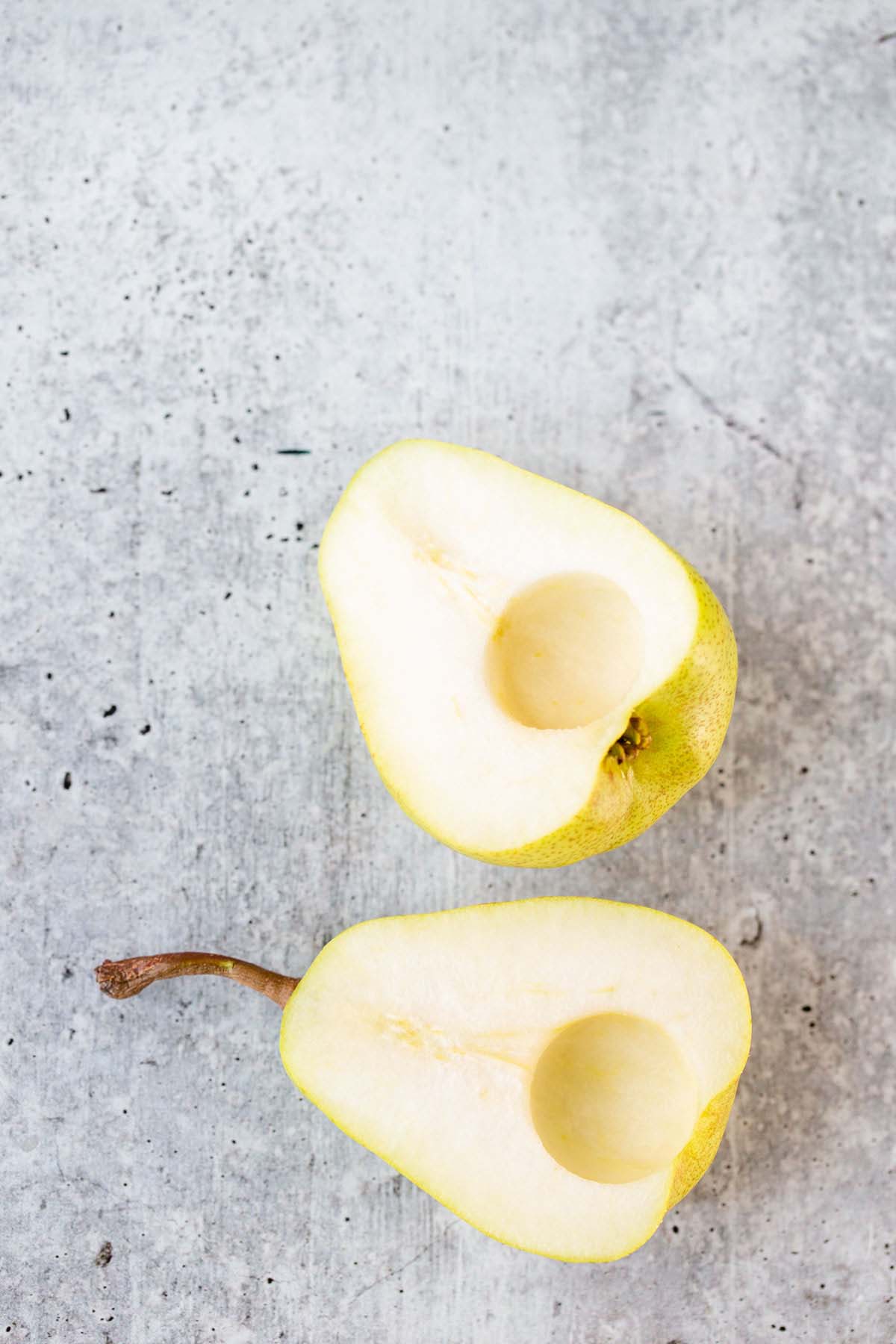 Bartlett pear sliced in half and cored.