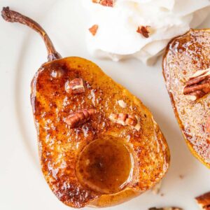 air fryer baked pears topped with chopped pecans