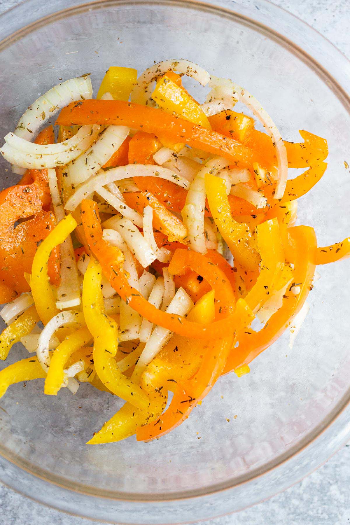 Peppers and onions in a bowl.