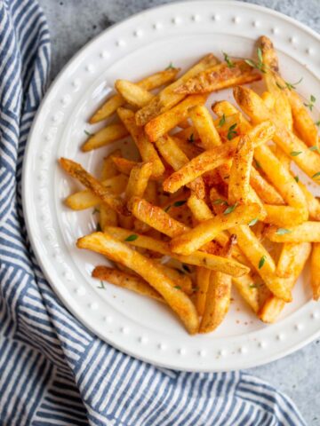 Peri-peri french fries on a plate.