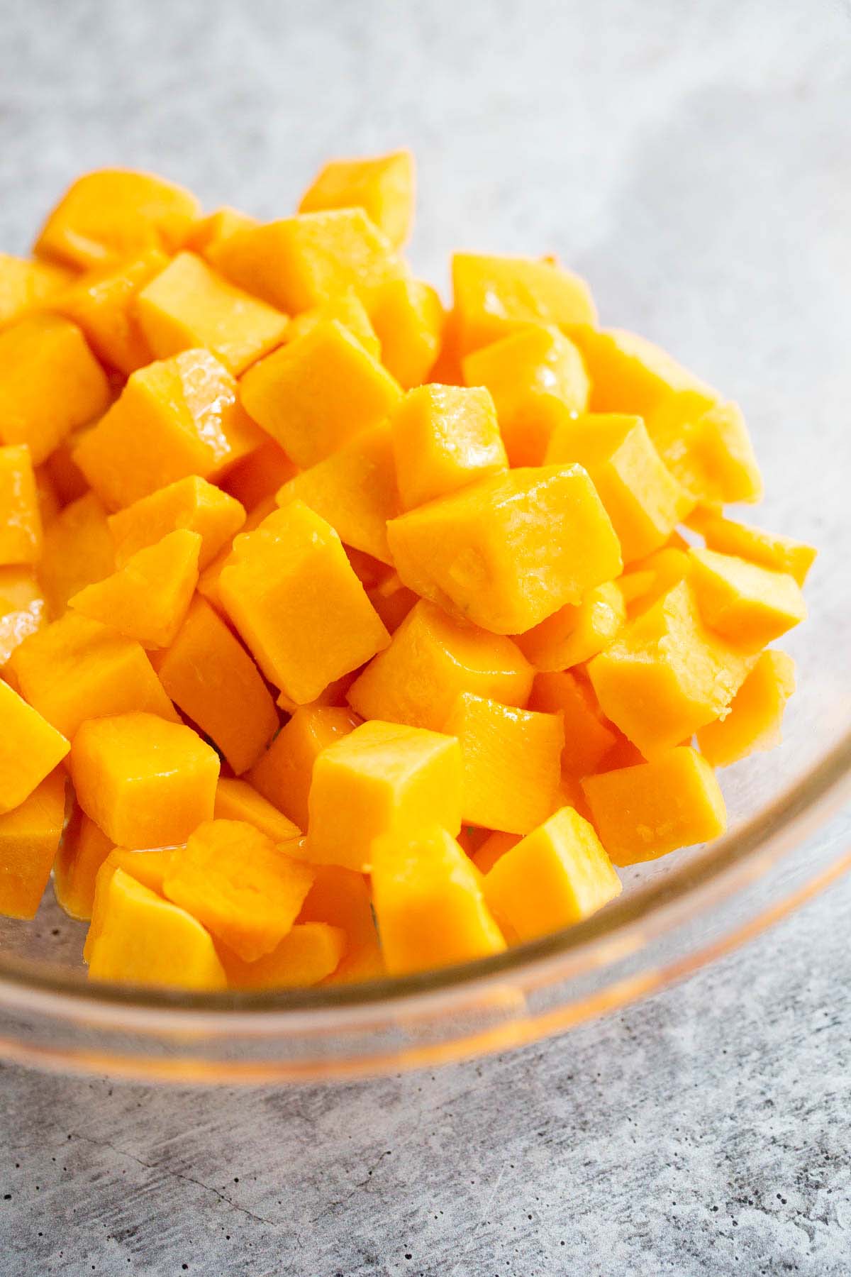 Butternut squash cubes in a bowl.