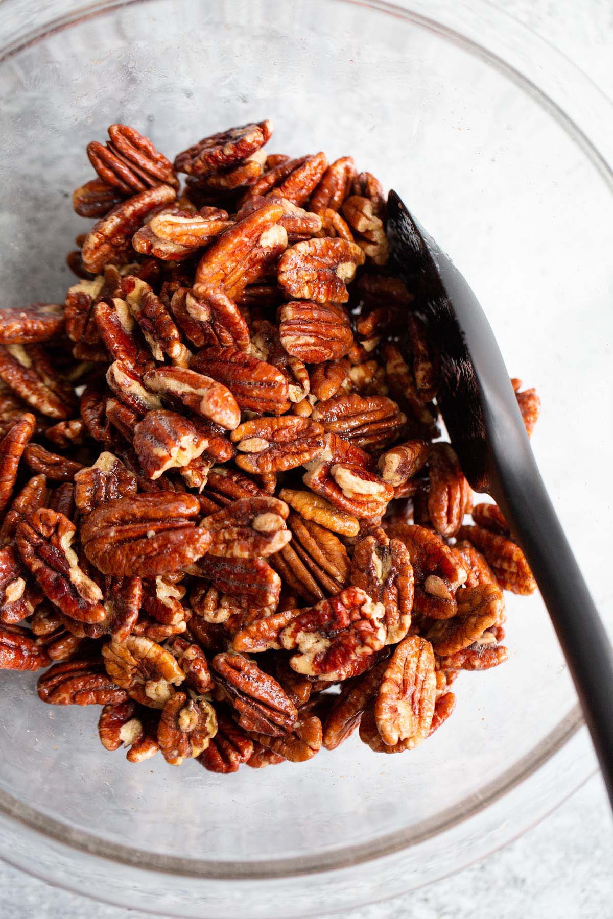 Pecans tossed in egg white mixture.