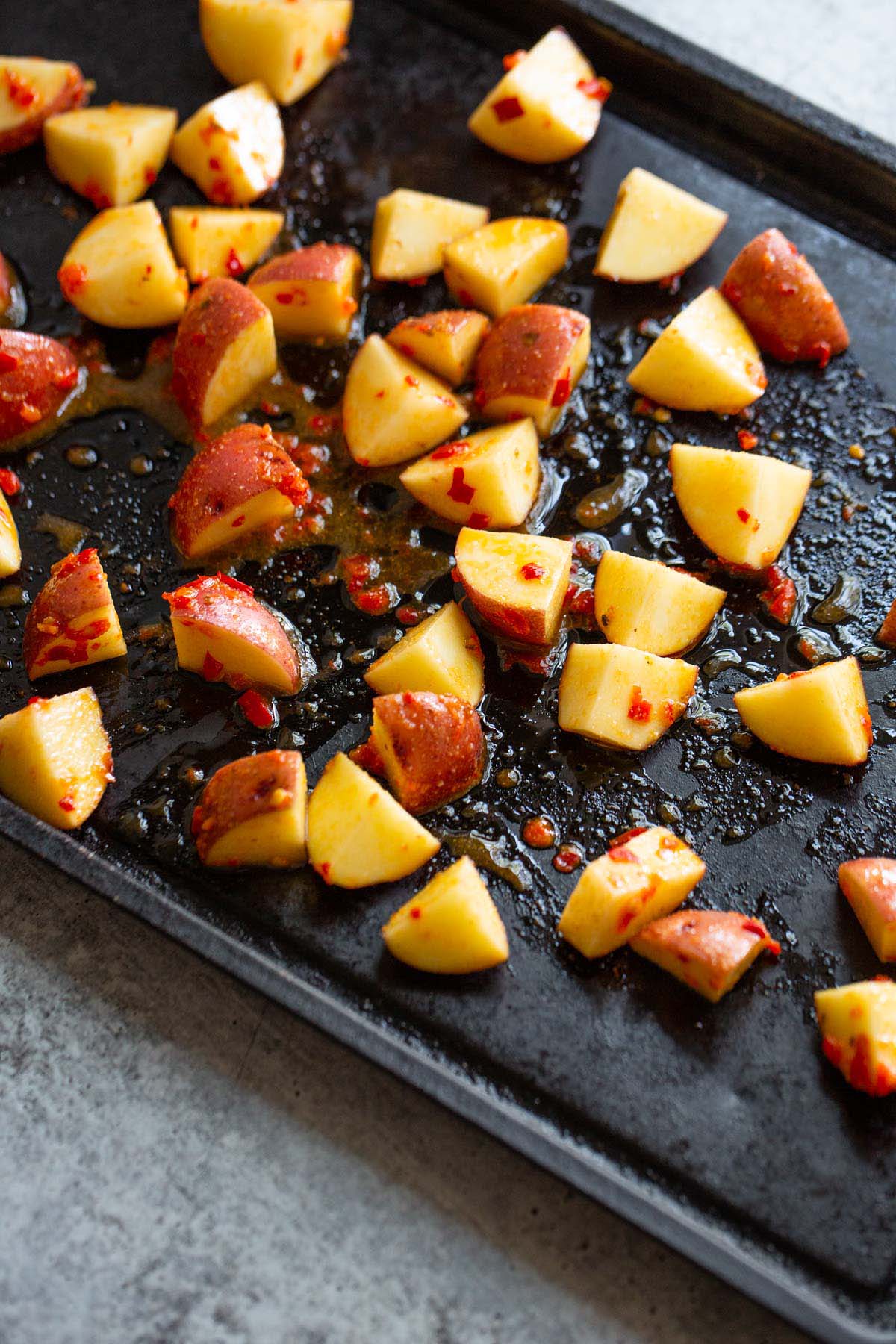 potatoes on a baking sheet.
