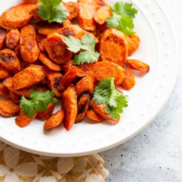 Roasted ras el hanout carrots with fresh cilantro.