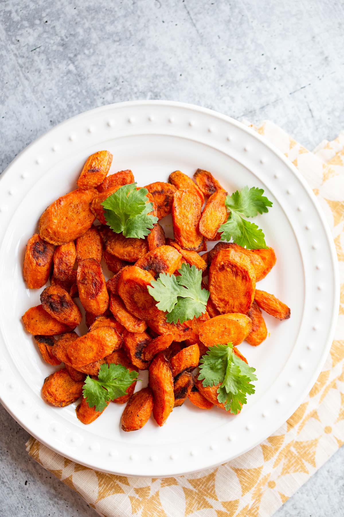 Roasted ras el hanout carrots with fresh cilantro.