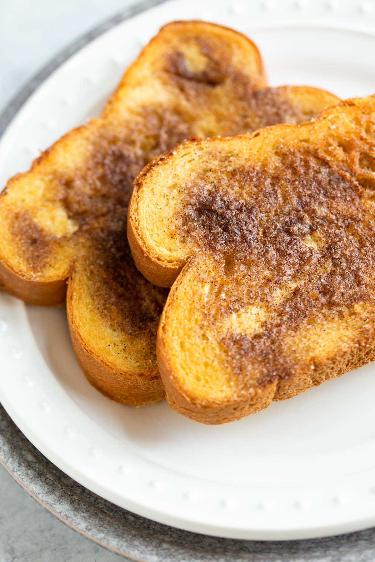 Air Fryer Cinnamon Toast on a White Plate