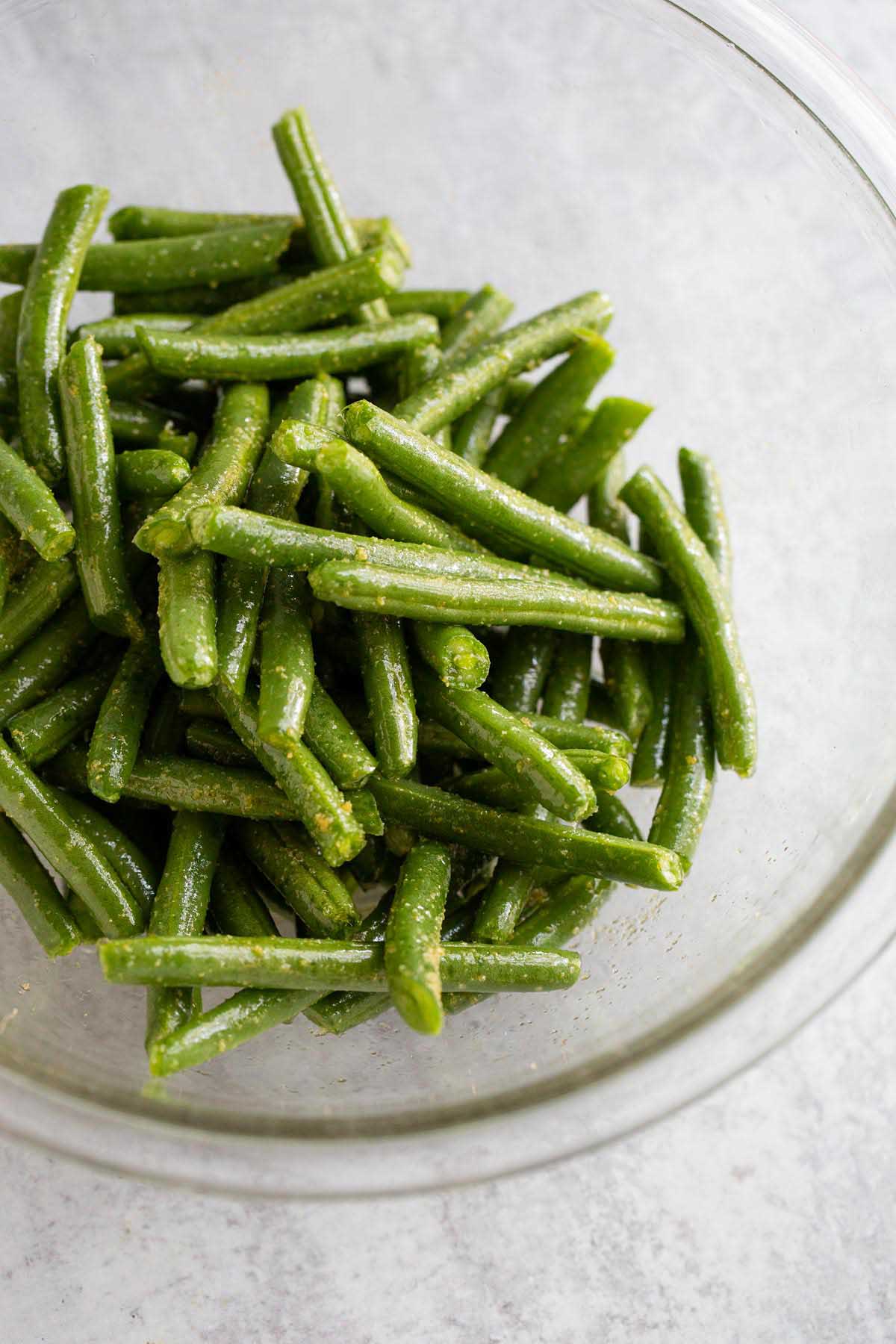 Seasoned green beans in a bowl.