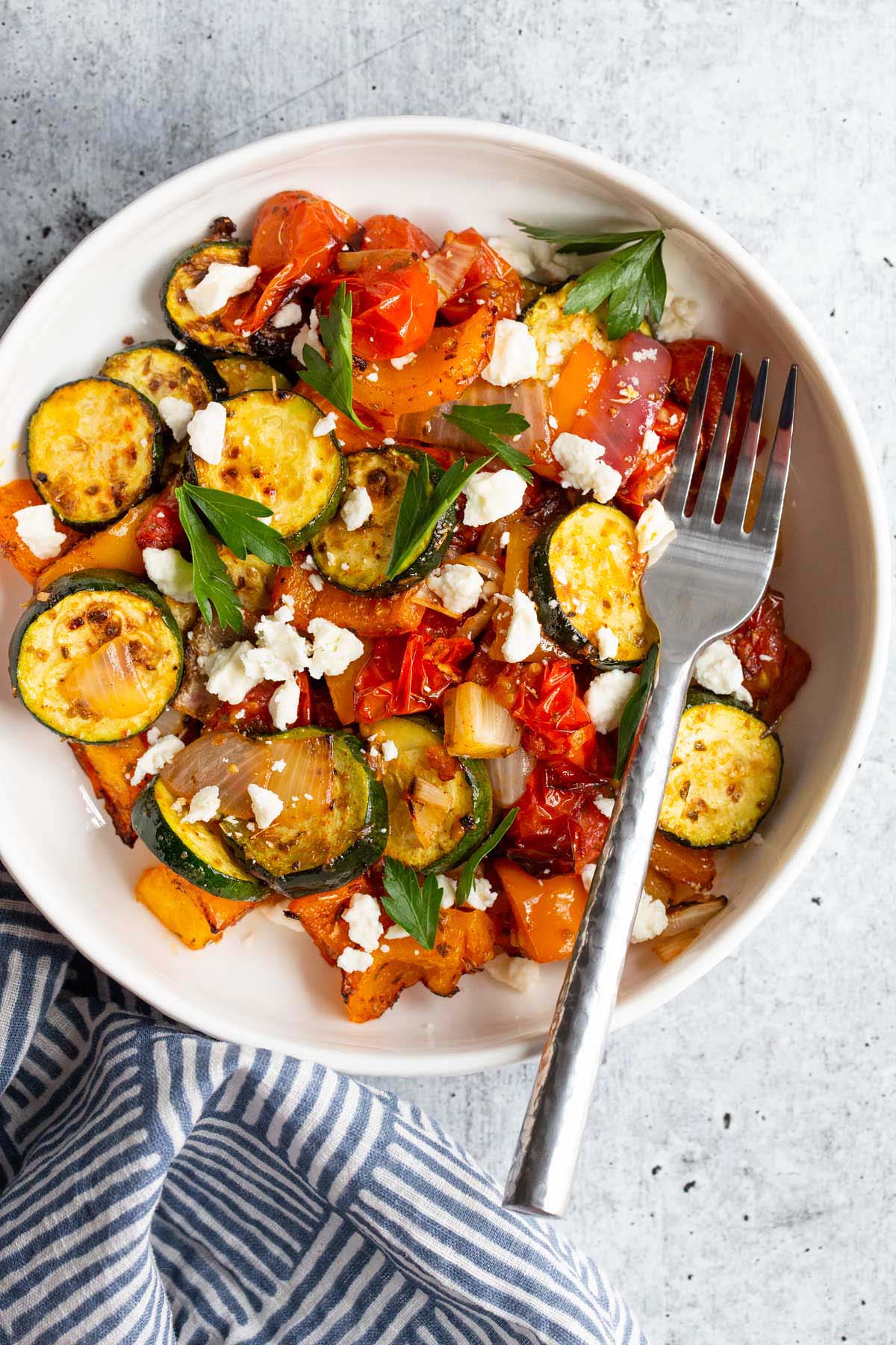 Air fried mediterranean vegetables with feta and parsley.