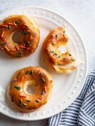 three donuts on a plate