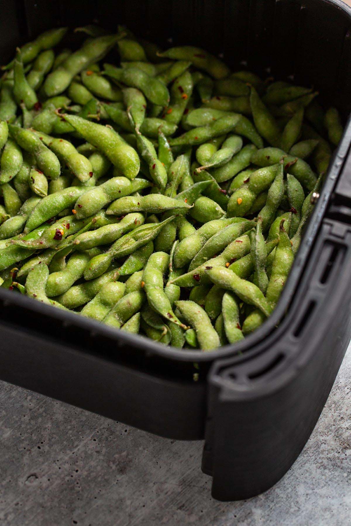 Frozen edamame in air fryer basket