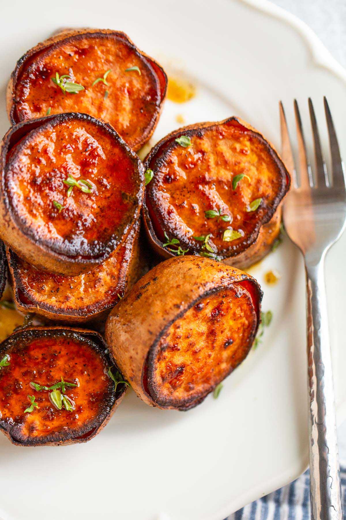 Melting sweet potatoes with sage and thyme.