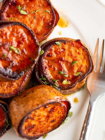 Melting sweet potatoes with sage and thyme.