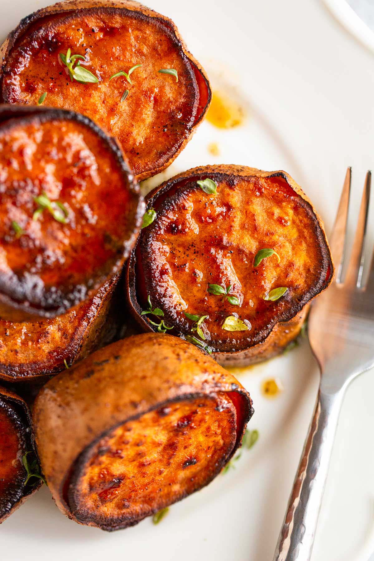 Melting sweet potatoes with sage and thyme.