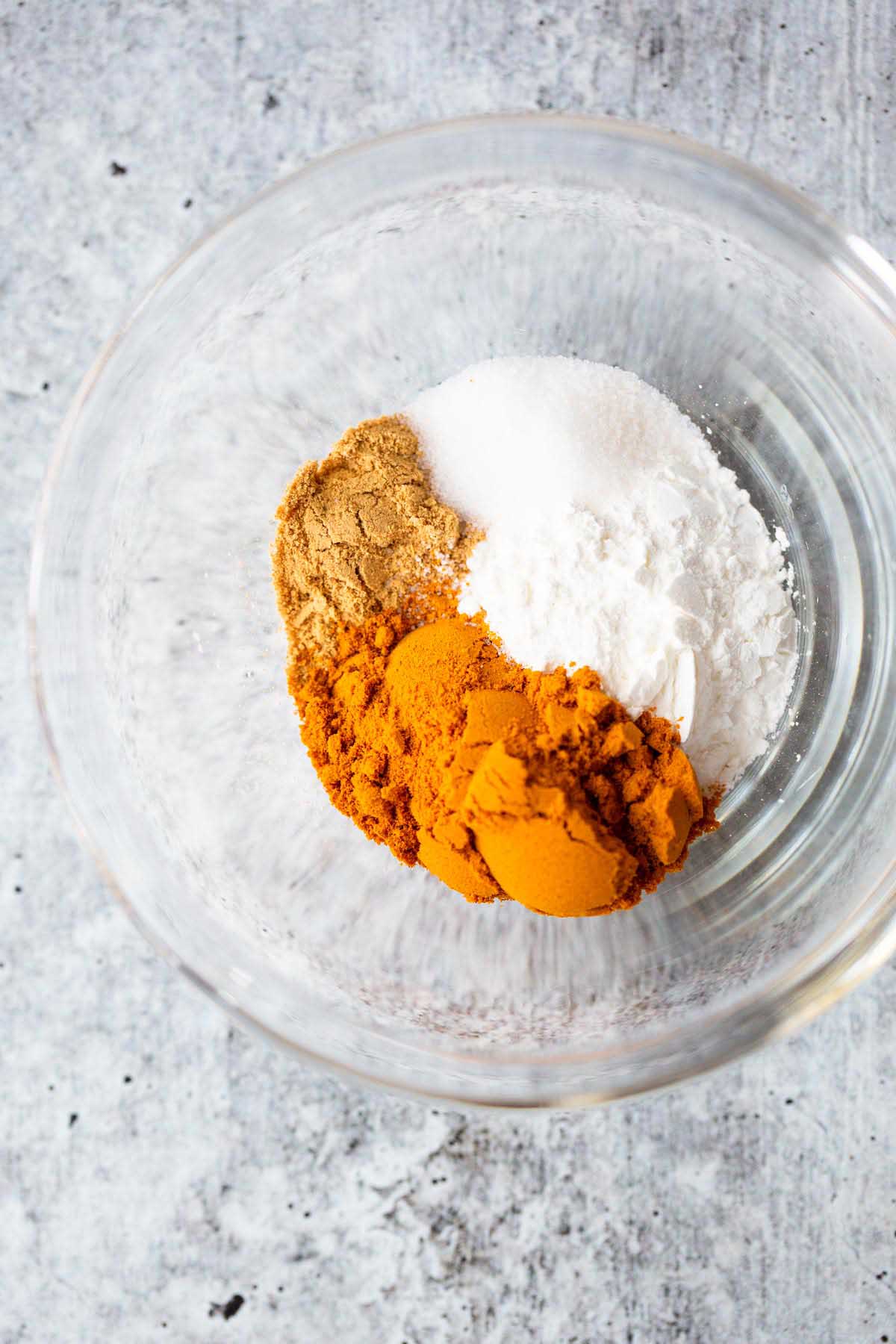 Turmeric and cornstarch in a bowl.