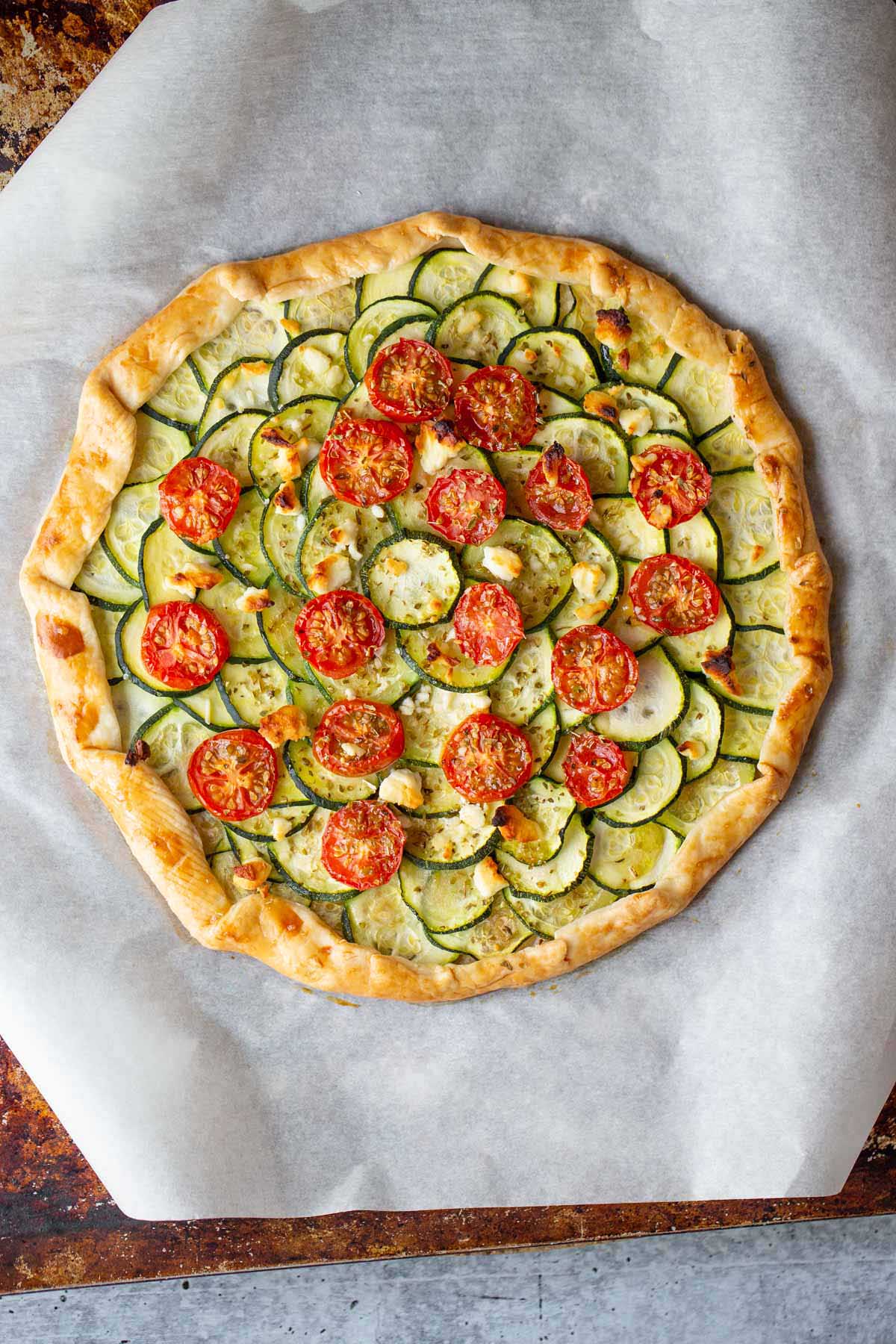 zucchini galette on a baking sheet