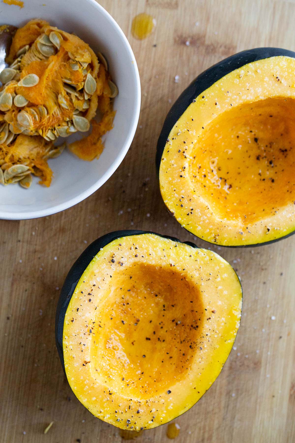 Acorn squash halves with oil and salt and pepper.