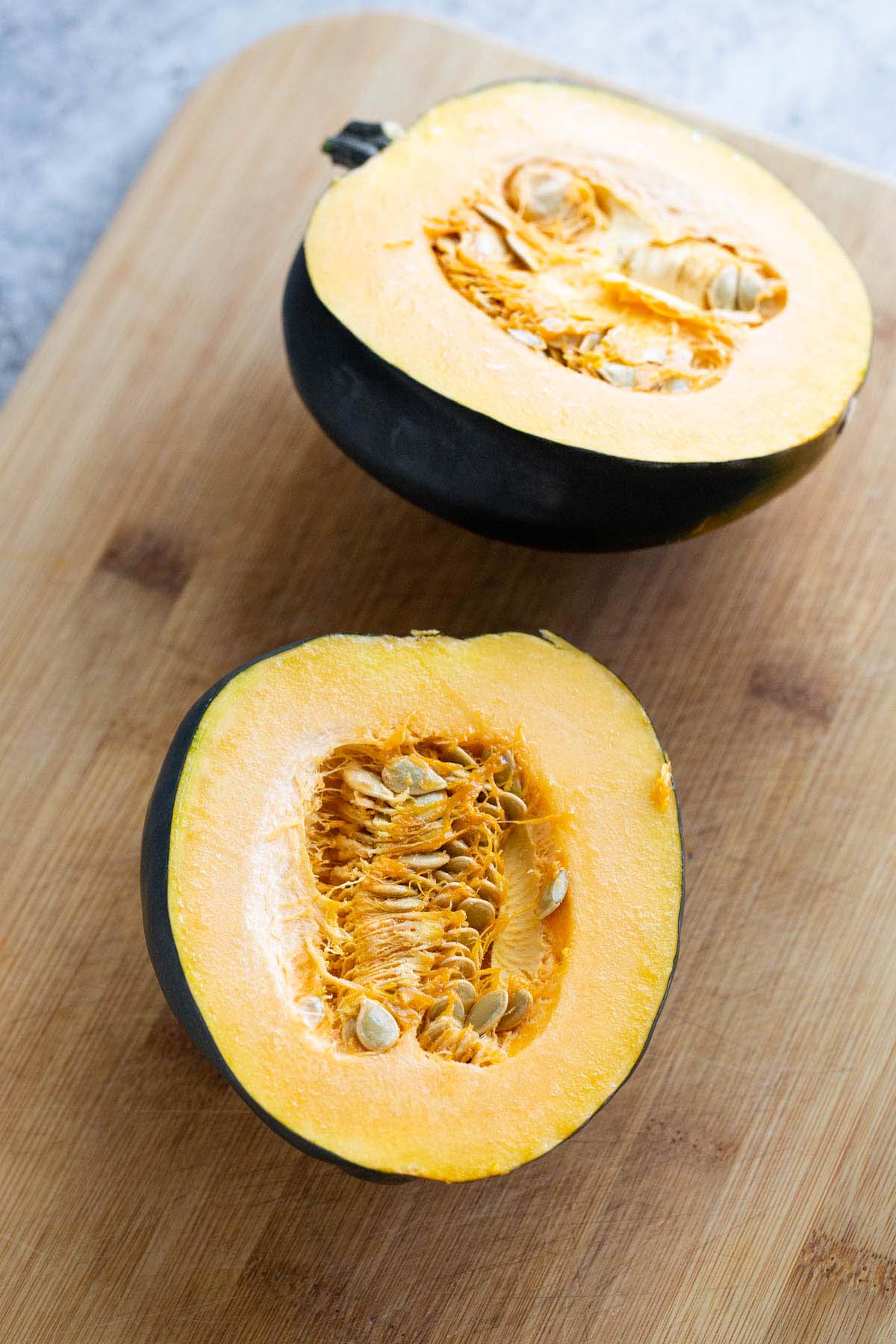 Acorn squash cut in half.