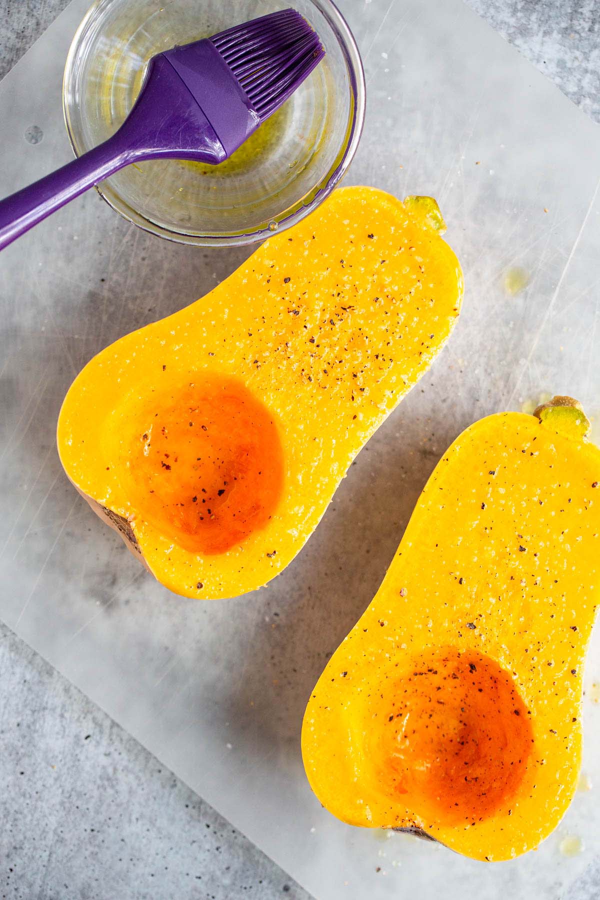 Butternut squash on a cutting board.