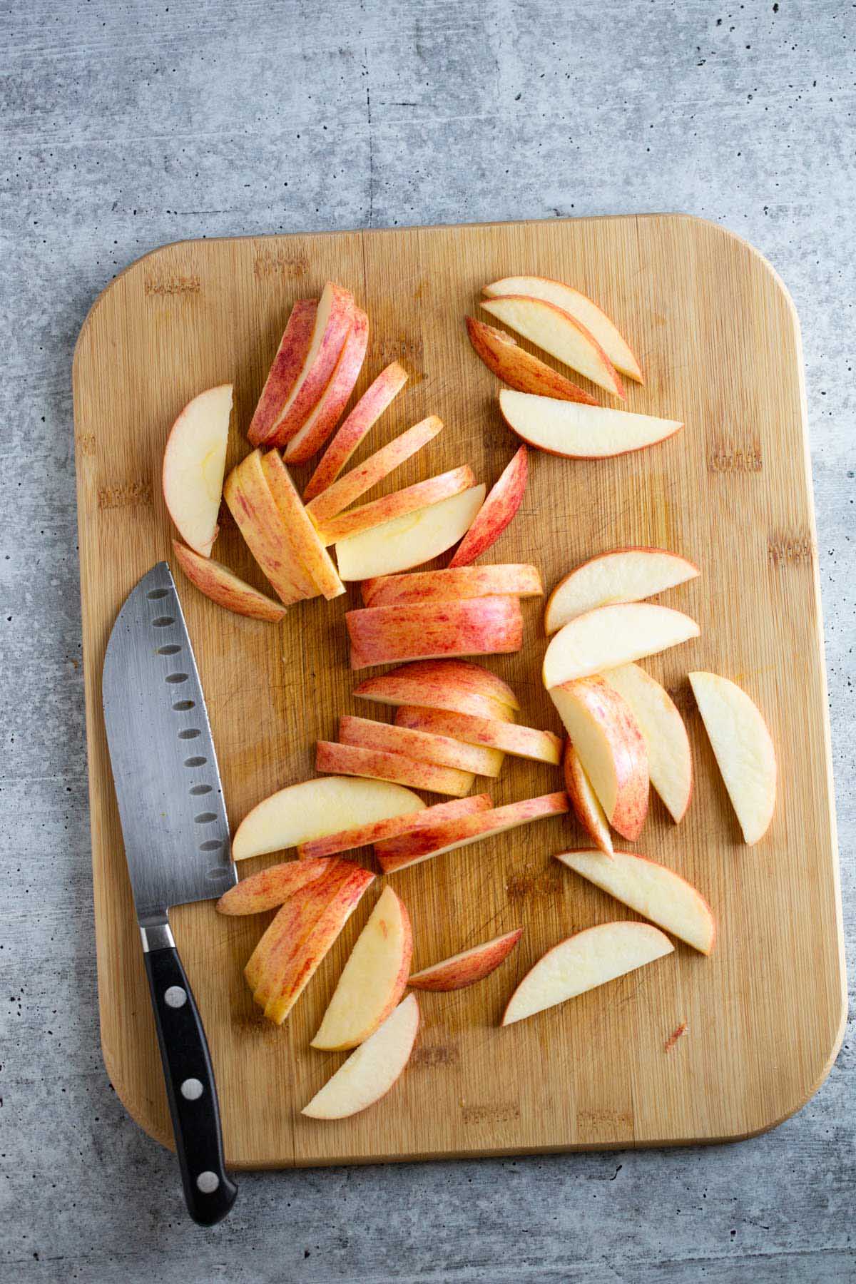 Sliced apples on a cutting board