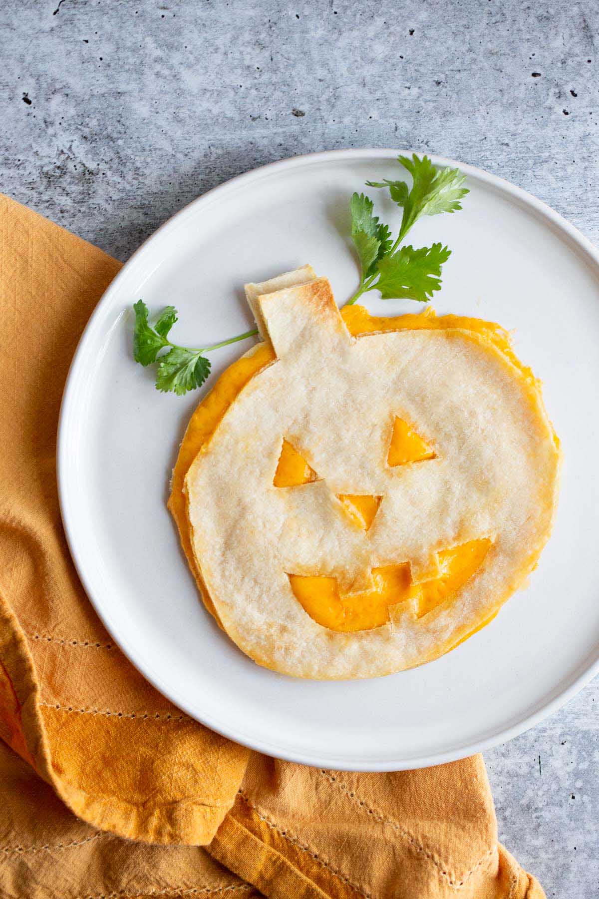 Halloween quesadilla with cilantro.