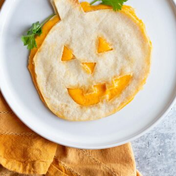 Halloween quesadilla with cilantro.