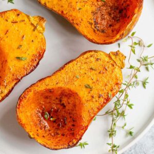 Air fryer honeynut squash on a plate.