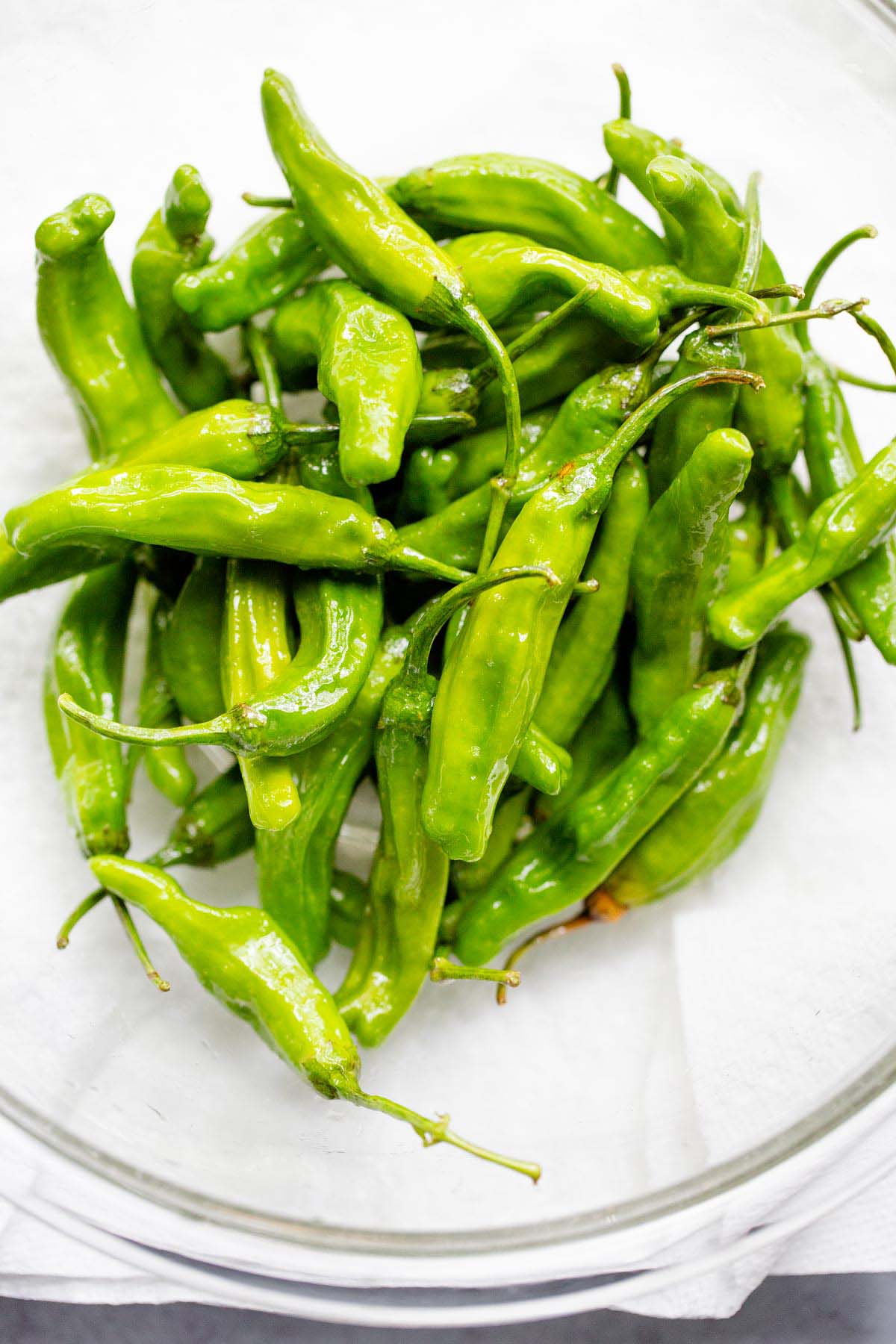 Shishito peppers in a bowl.