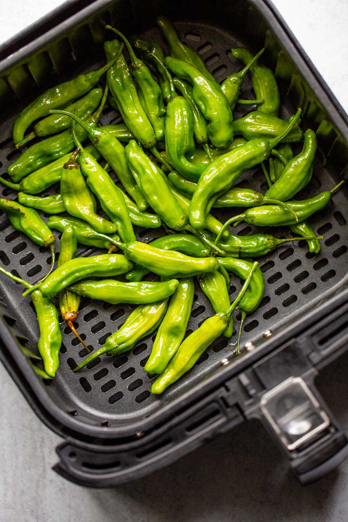 Shishito peppers in air fryer.