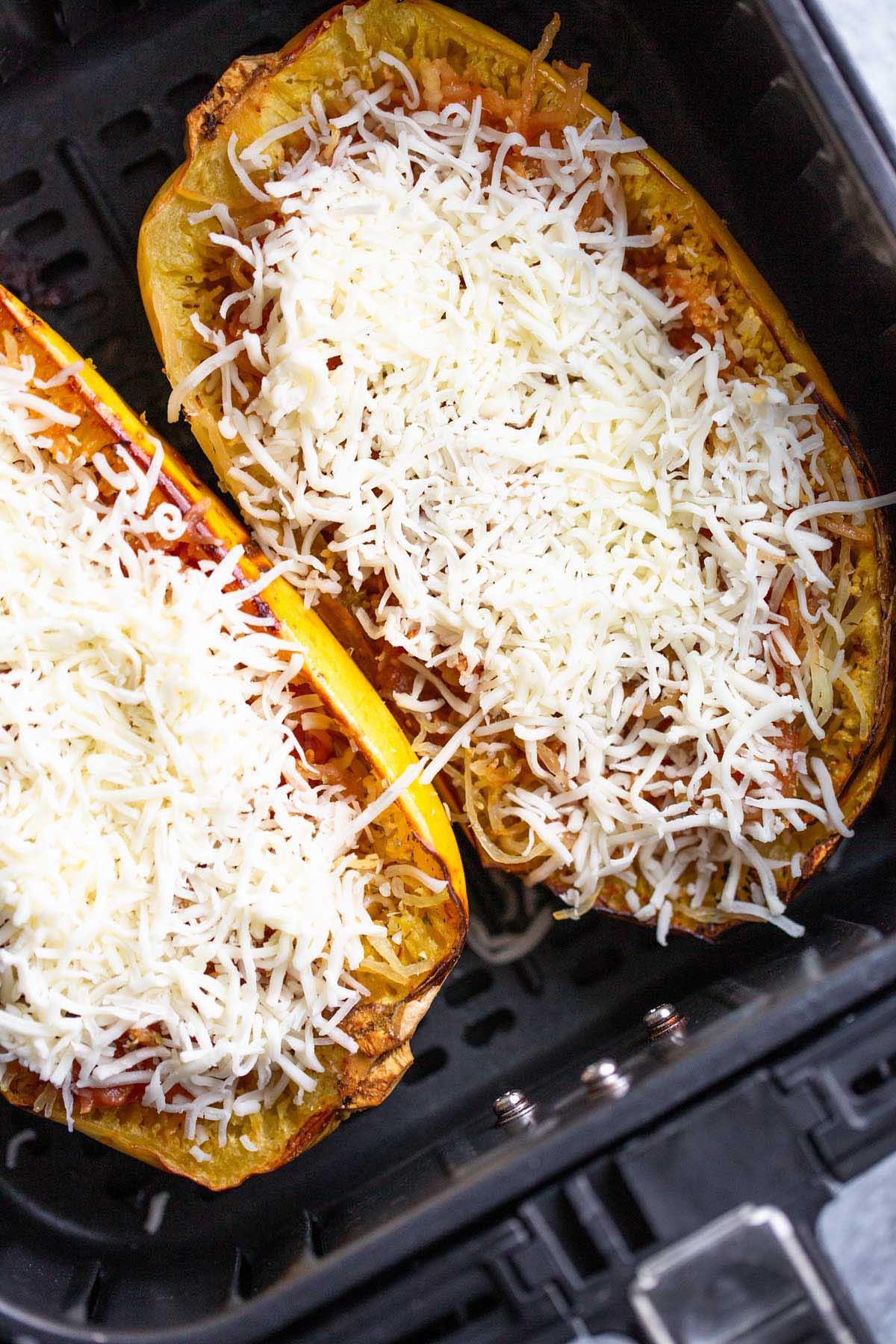 Spaghetti squash topped with shredded mozzarella.