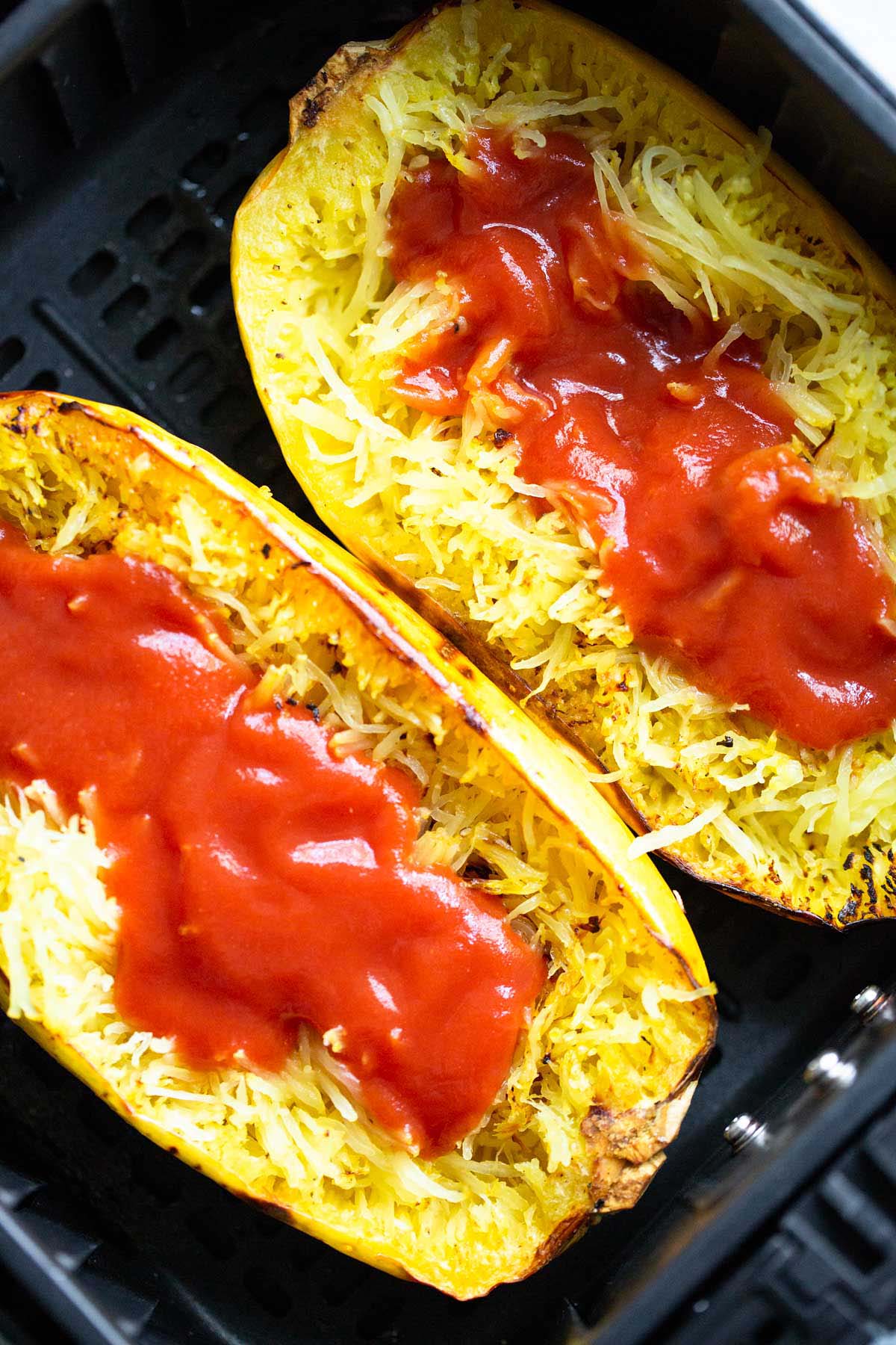 Spaghetti squash with tomato sauce.