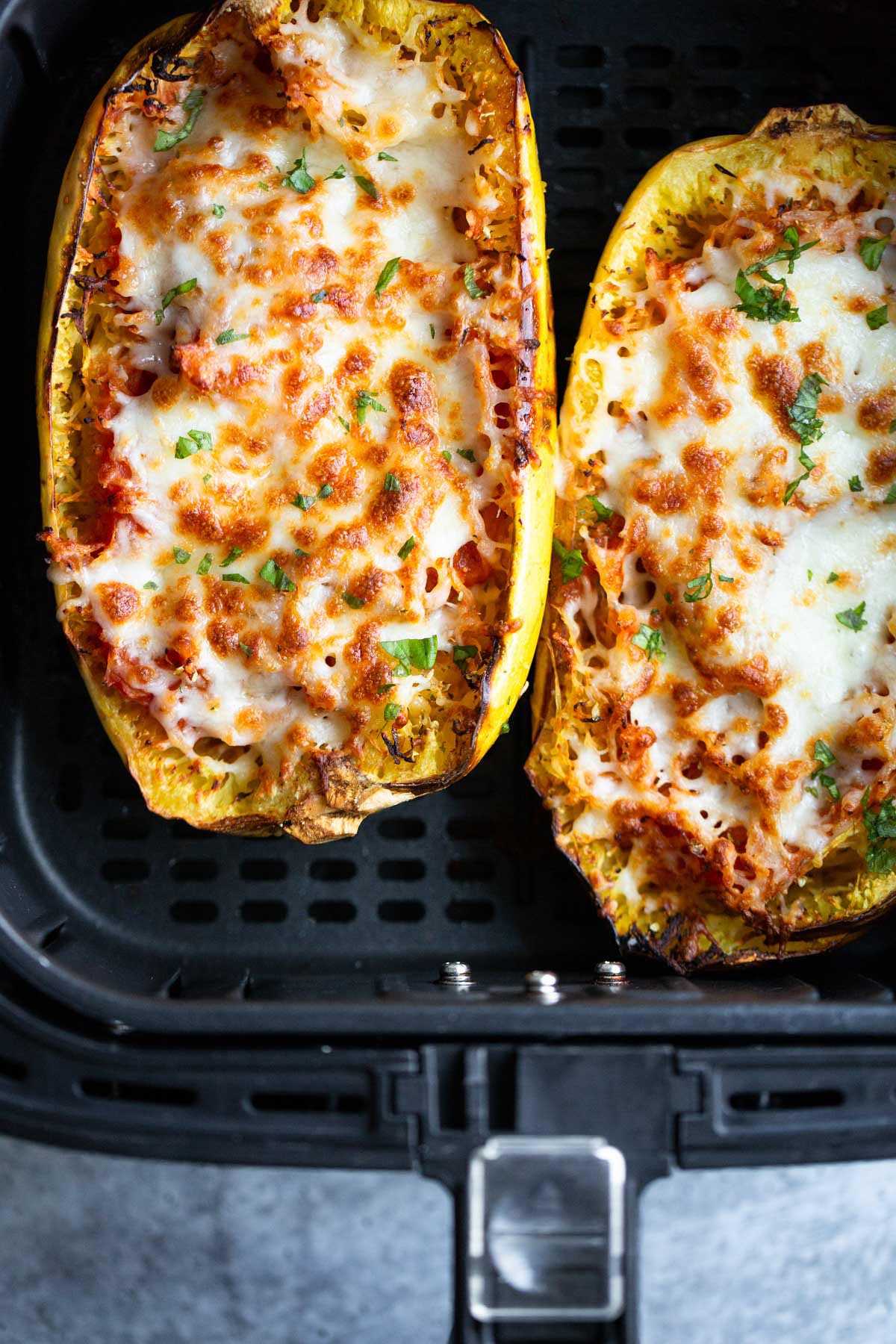 Cheesy spaghetti squash baked in air fryer.