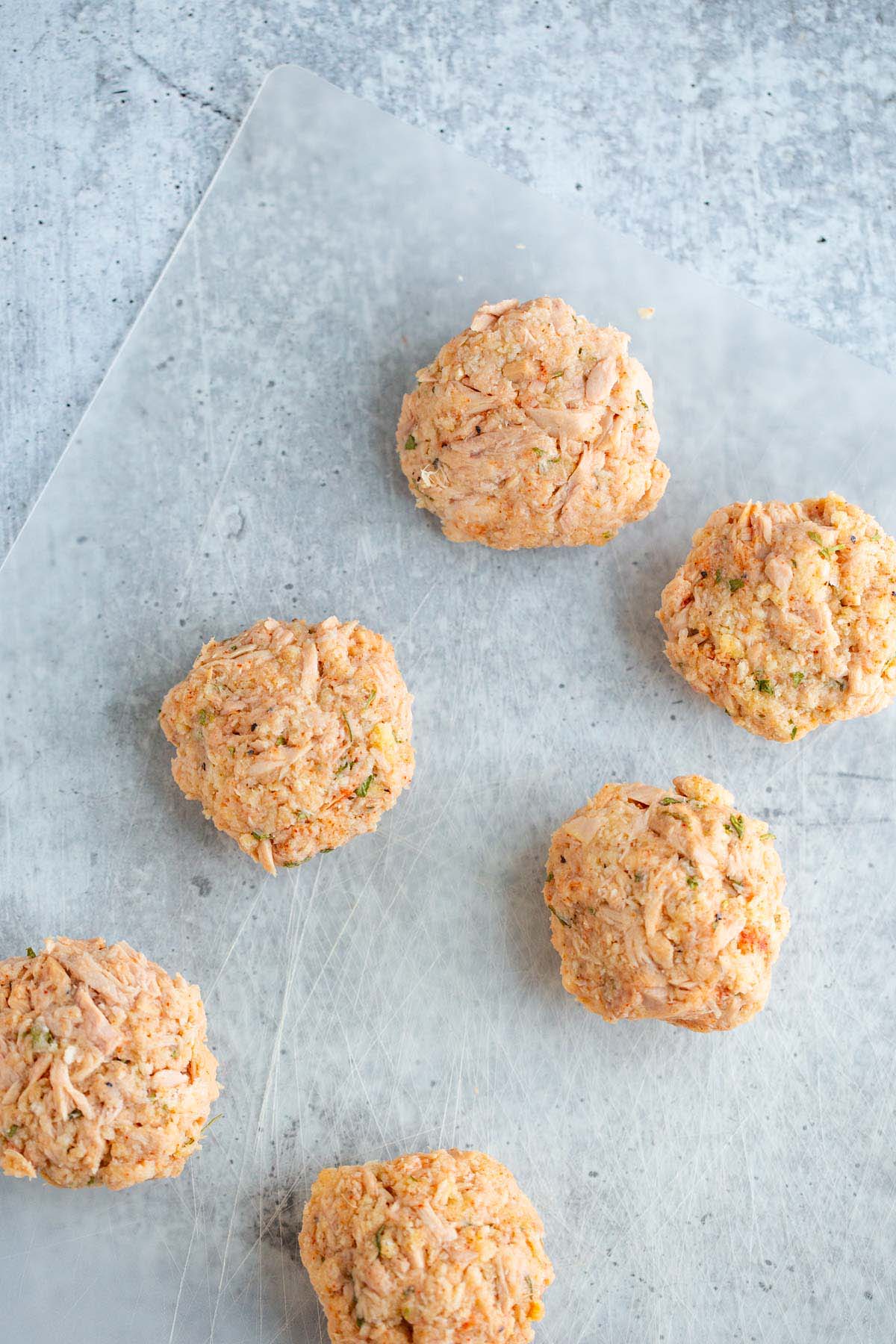 Forming tuna patties.