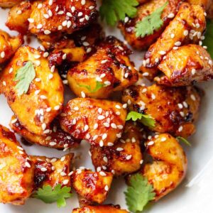 Honey sriracha chicken bites with sesame seeds