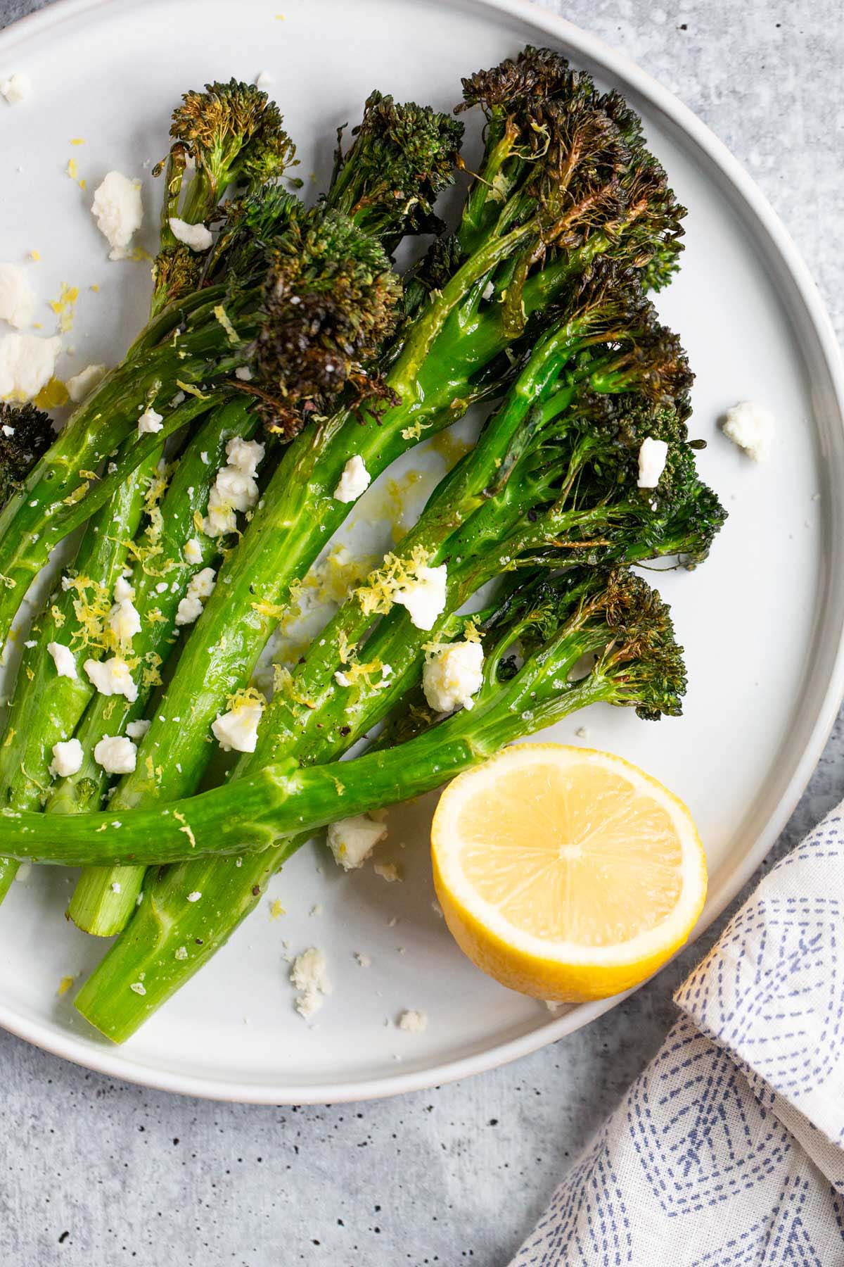 Air fried broccolini with feta and lemon.