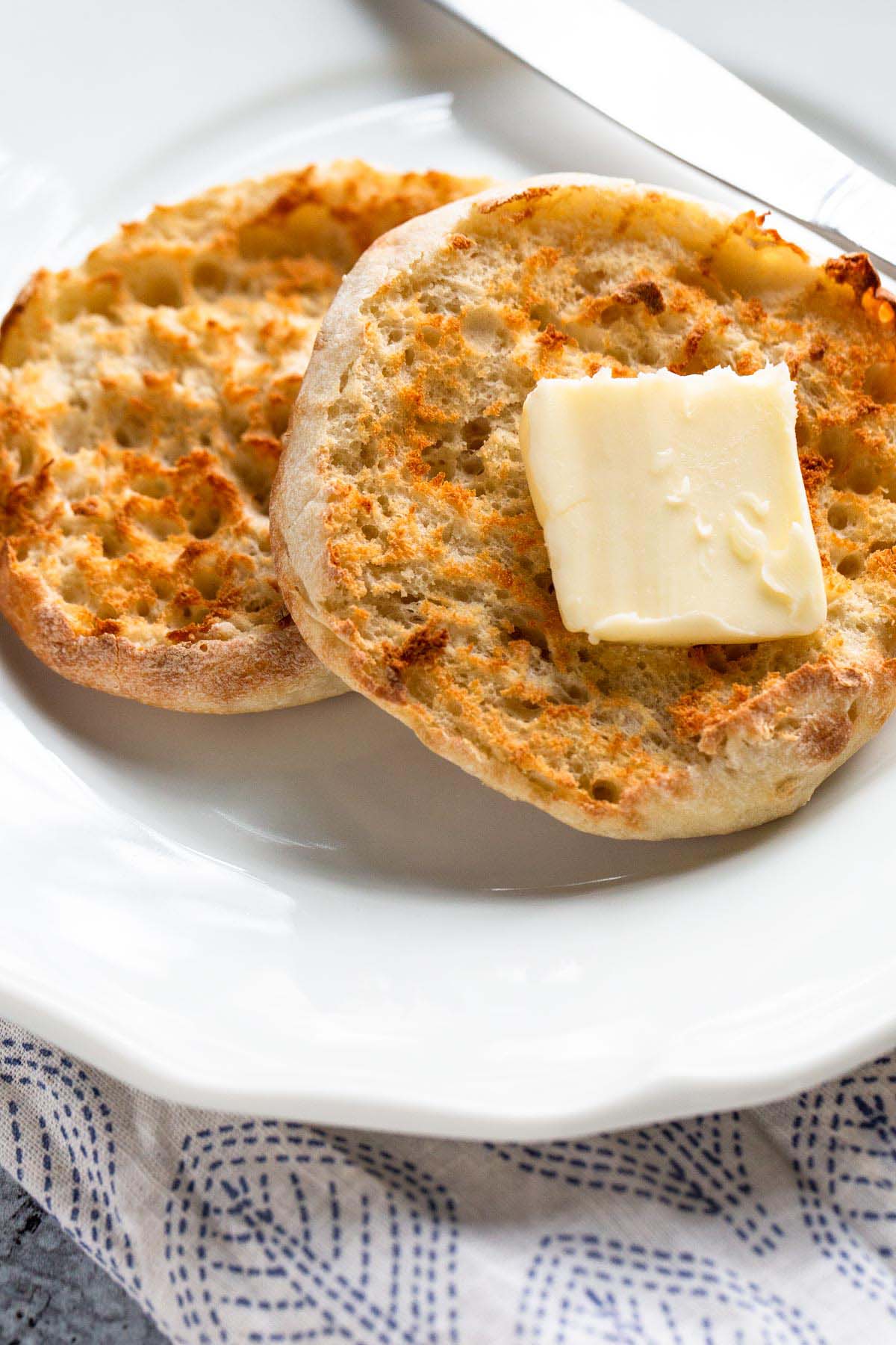 Toasted English muffin with butter.