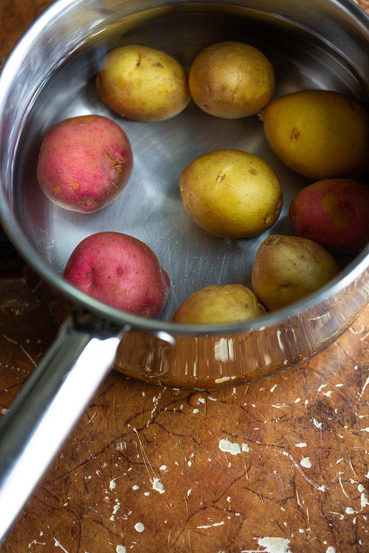 Potatoes in a pot with water.