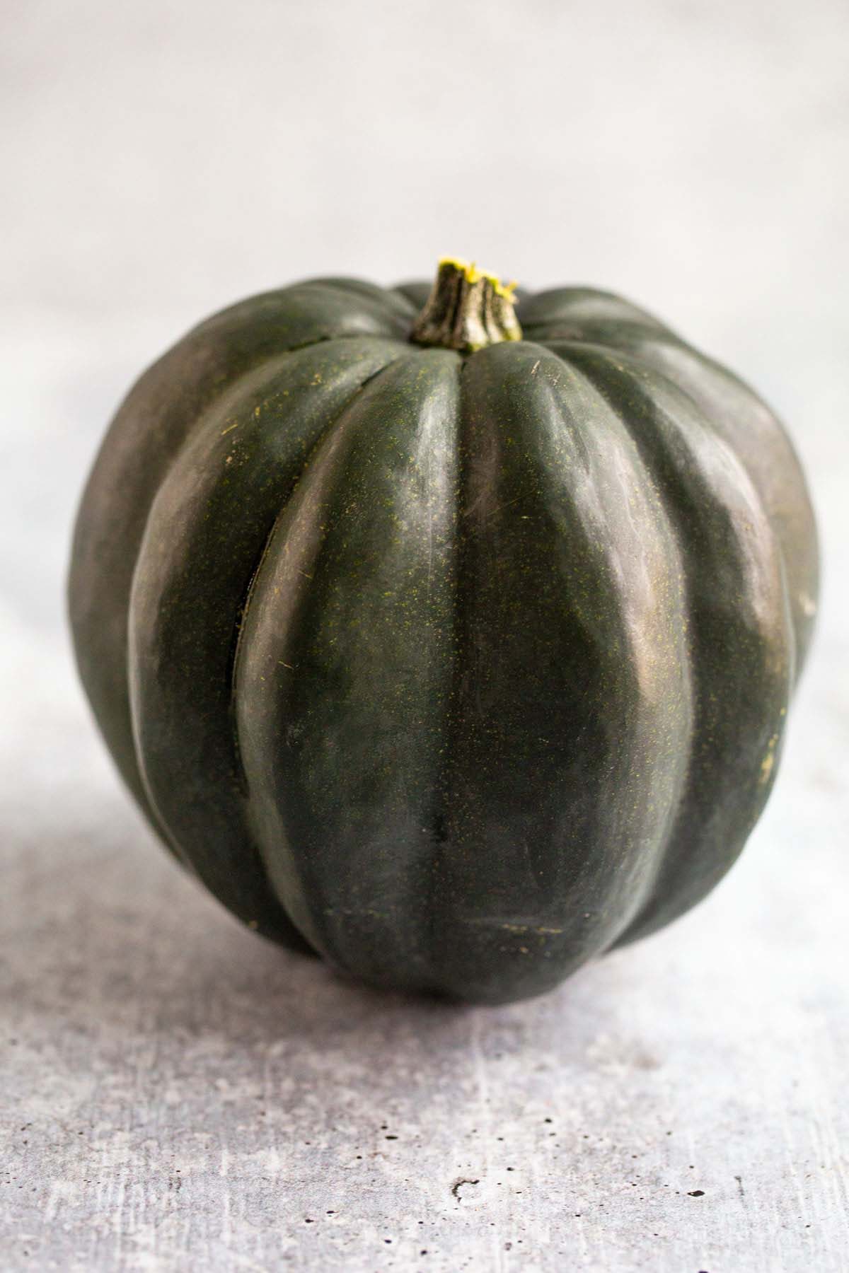 Whole acorn squash.