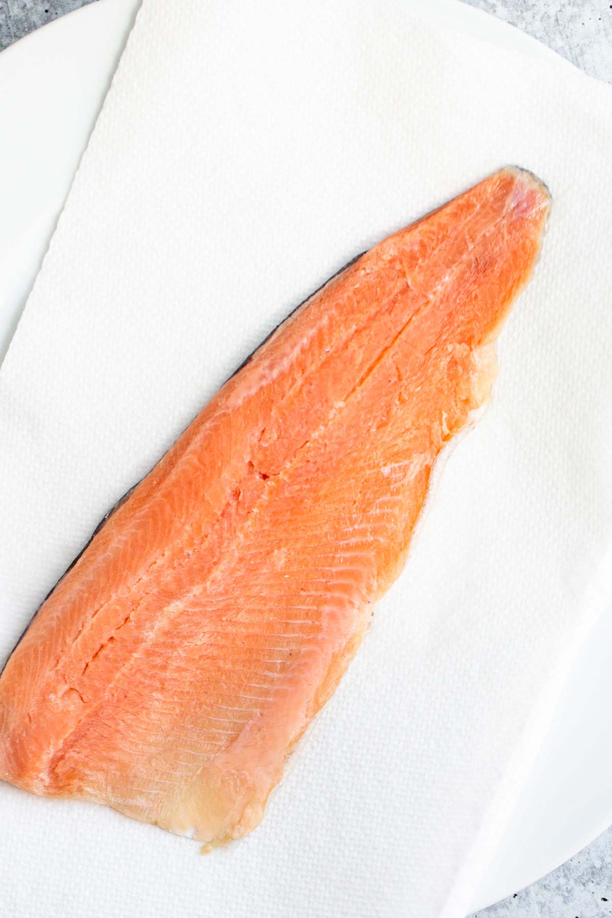 Raw rainbow trout.