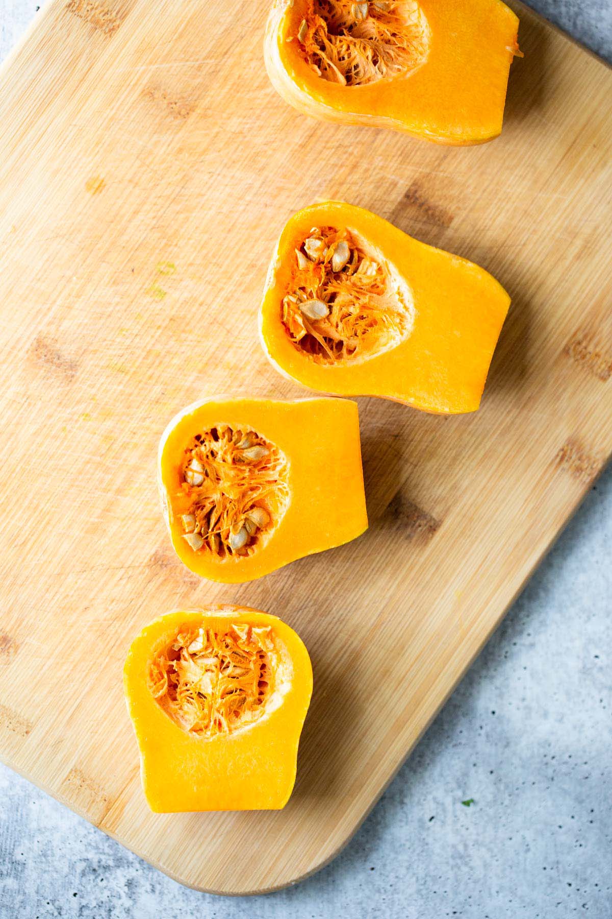 Honeynut squash sliced in half.