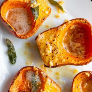 Roasted honeynut squash topped with a sage garlic butter.