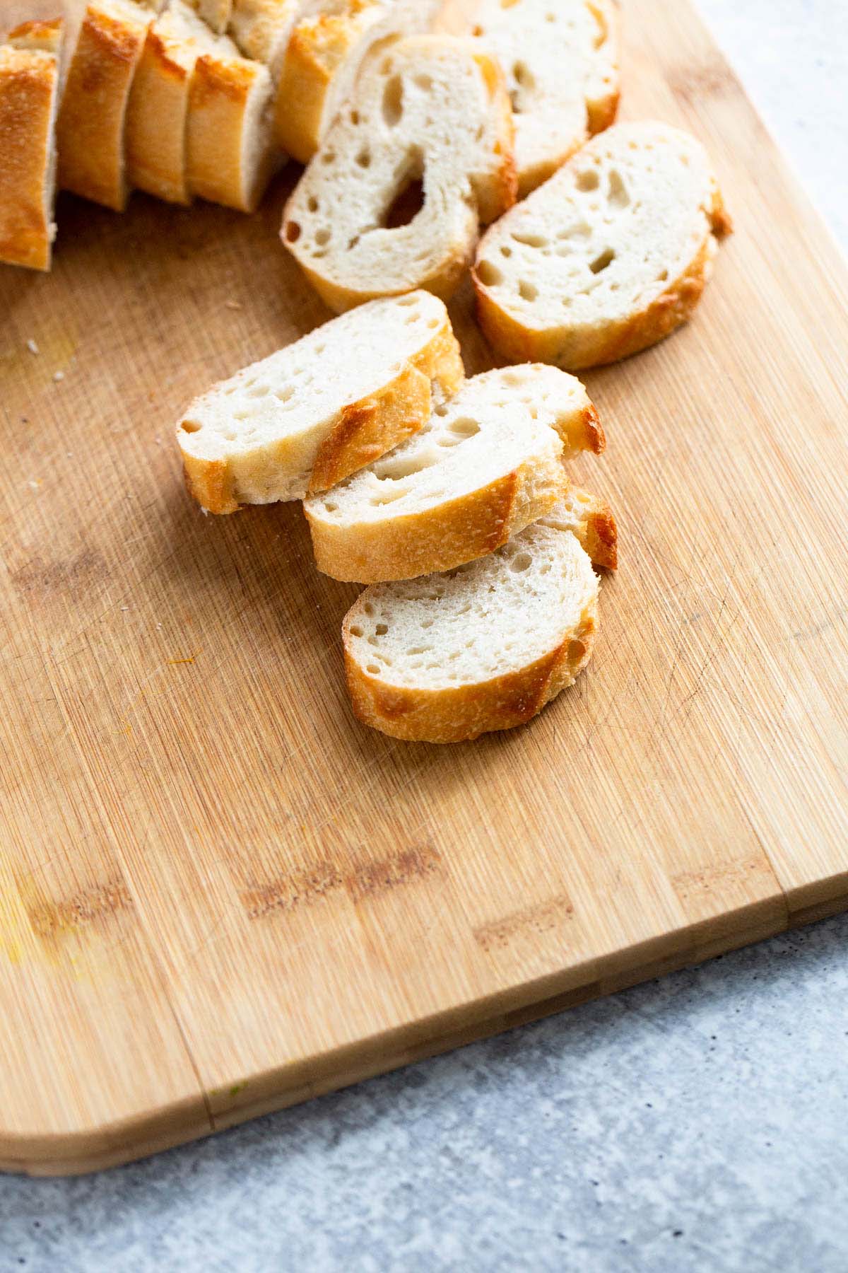 Sliced bread on a cutting board.