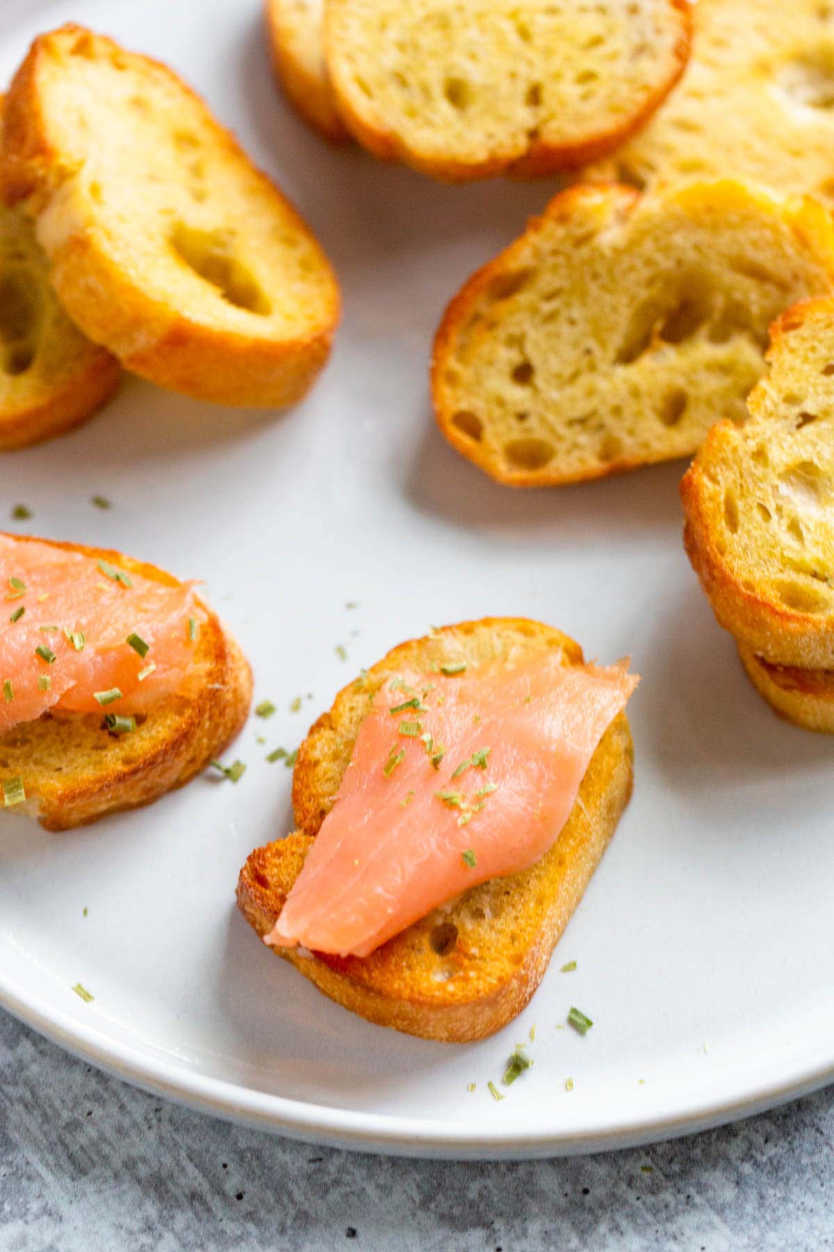 Crostini topped with smoked salmon.