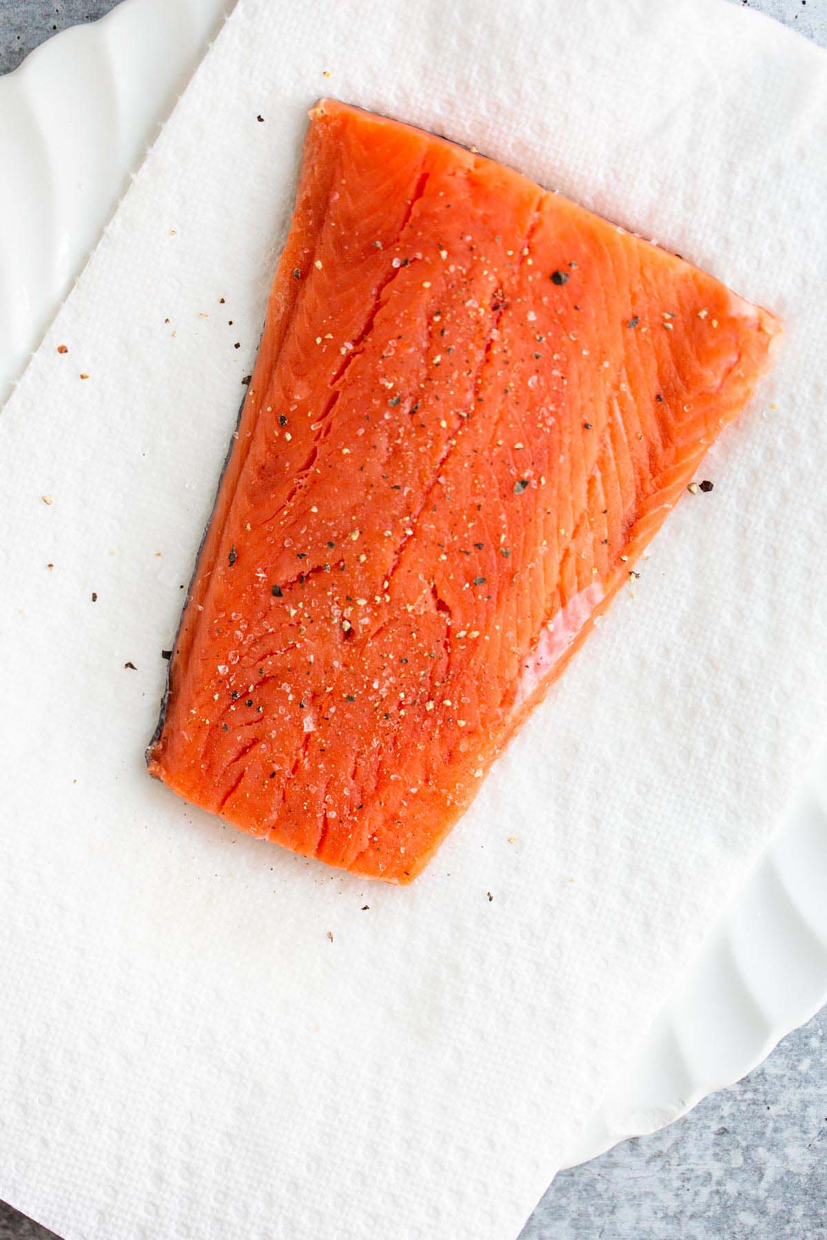 Salmon with salt and pepper.