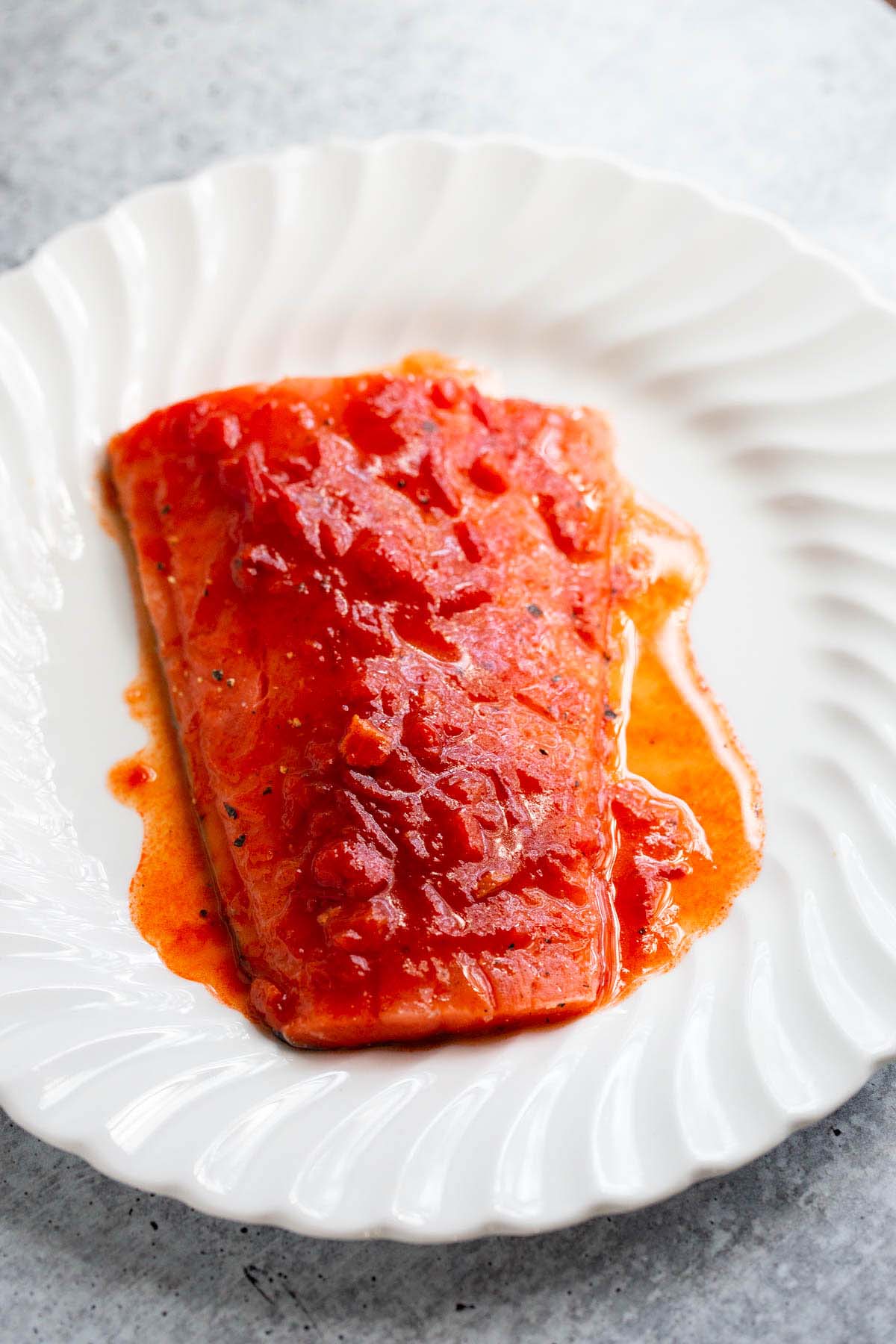 Harissa sauce on salmon.