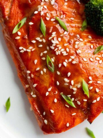 Air fryer miso salmon topped with sesame seeds.