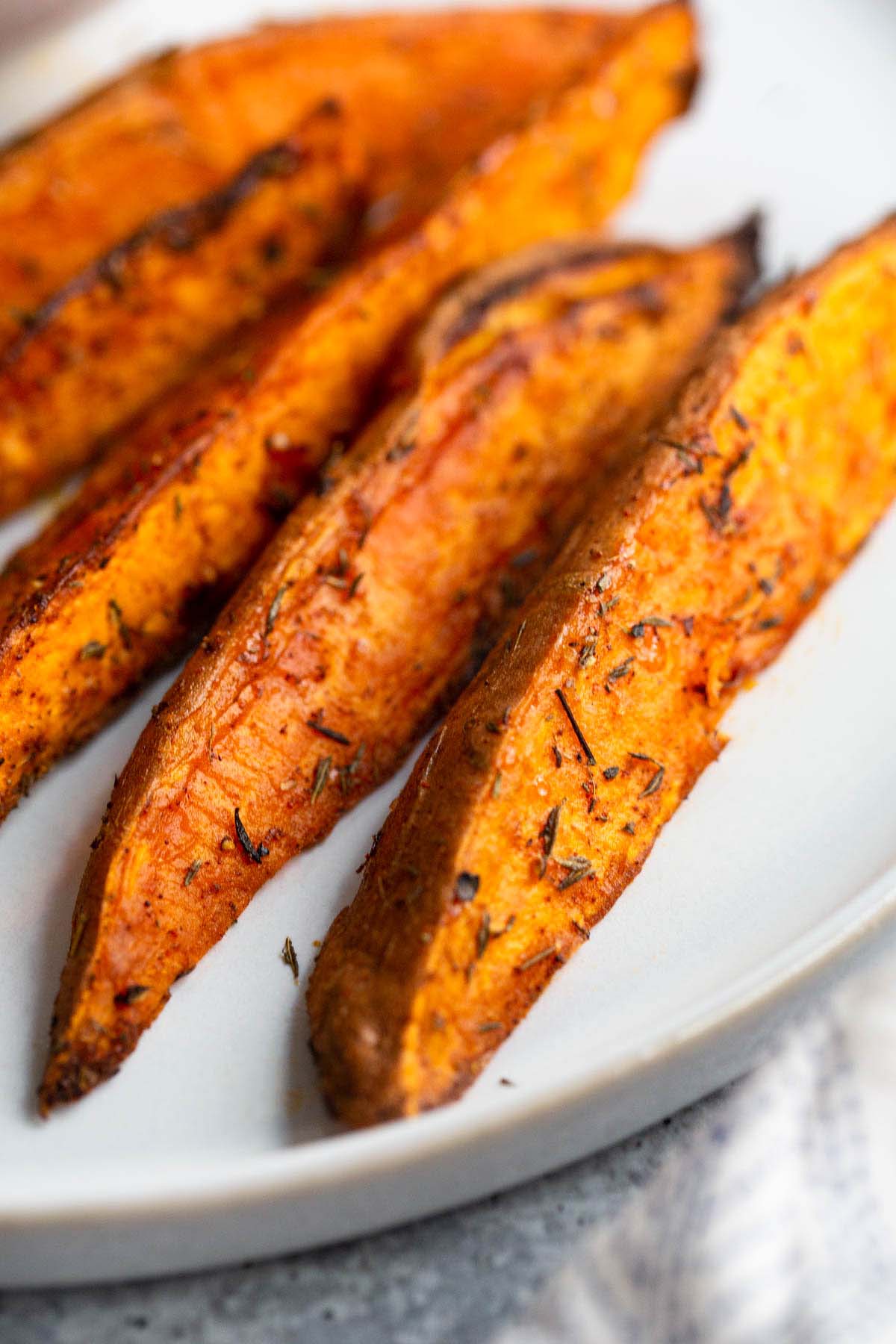 Air fried sweet potato wedges up close.