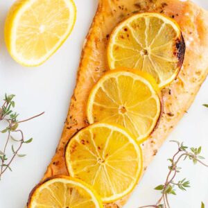 Air Fryer rainbow trout with lemon slices.