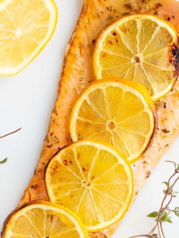 Air Fryer rainbow trout with lemon slices.